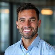 Portrait of a calm and professional male support engineer, ready to assist