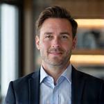 Headshot of Liam Henderson, Director of Personal Tech Curation at Luxury Gadgets.